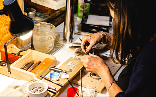 Emily Crawford at work in her studio at Bendigo Pottery's Village of Artisans.