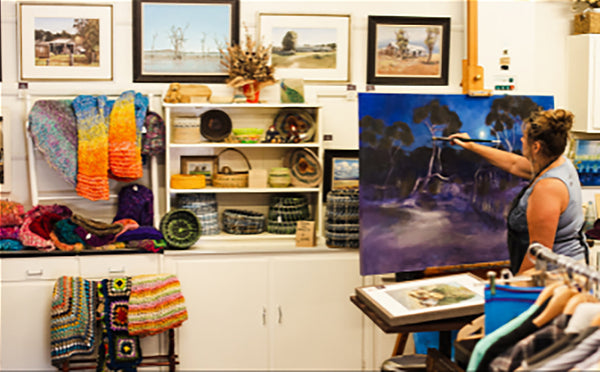 Joy Tatt at work in her workspace at Village of Artisans in Bendigo Pottery