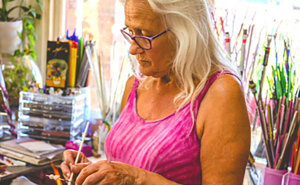 Leanne Grylls at work in her studio space at Village of Artisans, Bendigo Pottery.